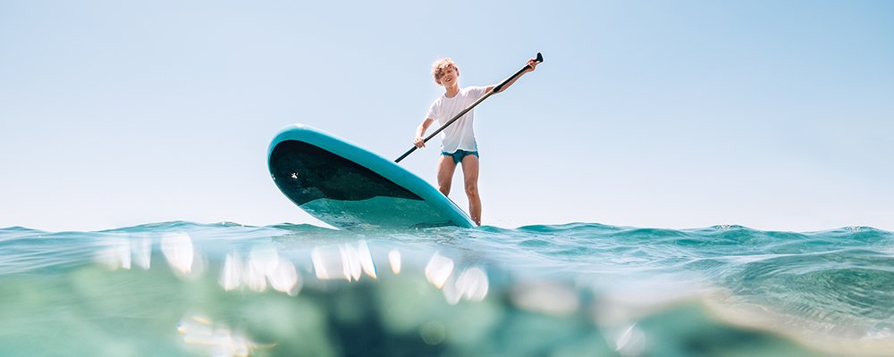tablas de paddle surf en la arena