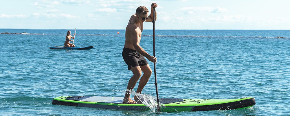 man on a sup board
